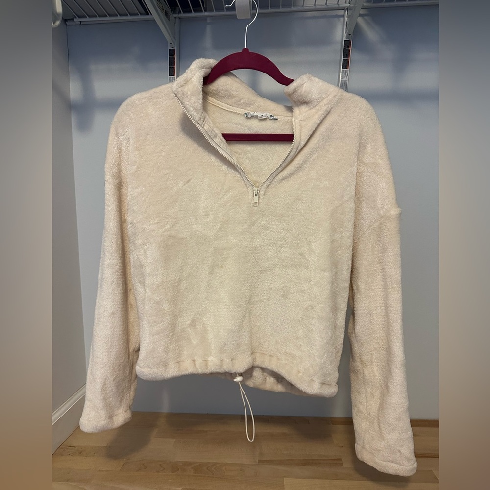 Soft, fleece, cropped quarter zip.